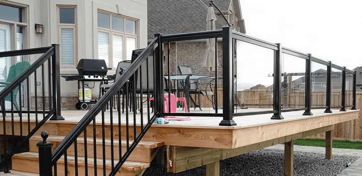 Handrail installation on a deck staircase for safety and code compliance in Sterling Heights, MI