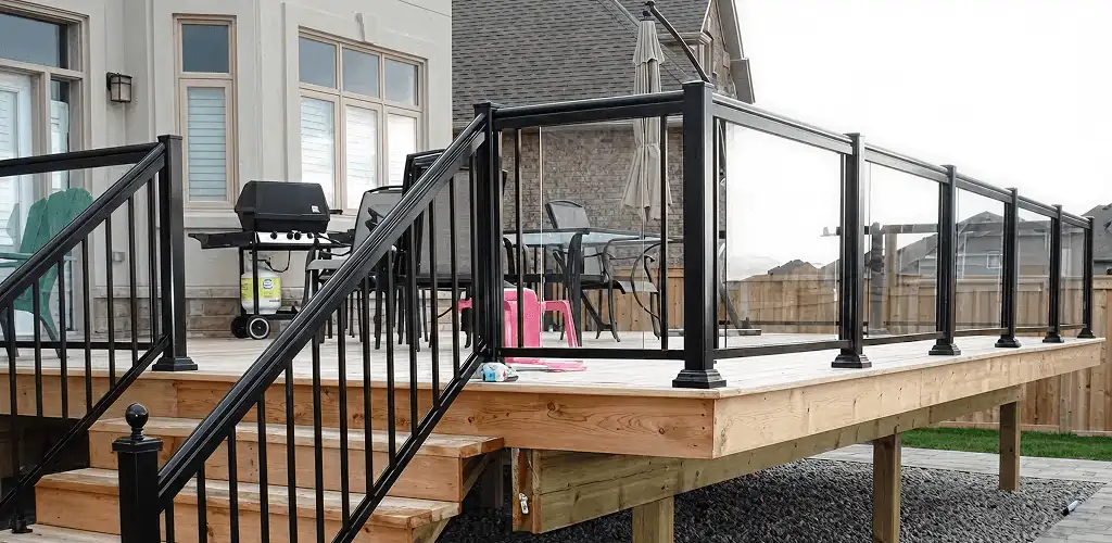 Handrail installation on a deck staircase for safety and code compliance in Sterling Heights, MI